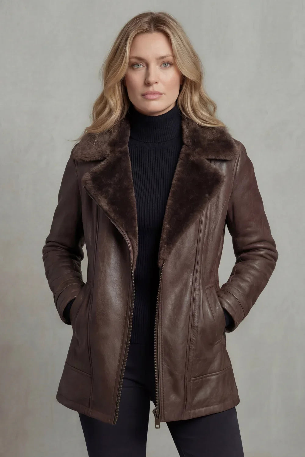 Brown leather jacket for women, front view worn open over a knit