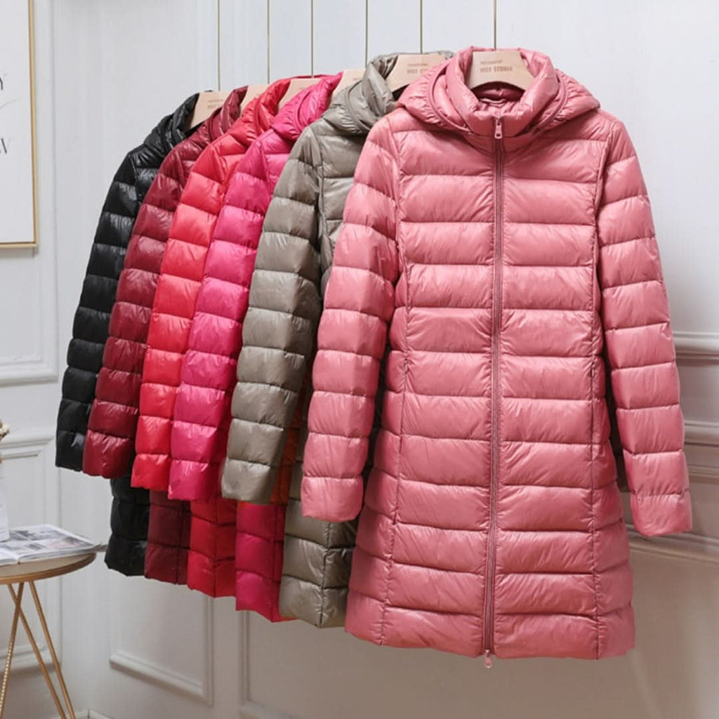 Hooded lightweight down jacket on a plain backdrop