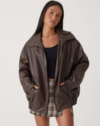 Oversized faux leather bomber jacket in Brown
